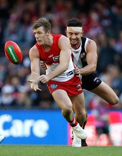 AFL 2017 Round 09 - St Kilda v Sydney MELBOURNE, AUSTRALIA - MAY 20: Luke Parker of the Swans is tackled by Billy Longer of the Saints during the 2017 AFL round 09 match between the St Kilda Saints and the Sydney Swans at Etihad Stadium on May 20, 2017 in Melbourne, Australia. (Photo by Michael Willson/AFL Media)